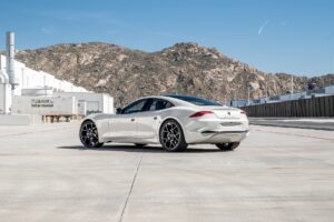 Southern California-based automaker Karma Automotive today announced the creation of three custom GS-6 vehicle variants with unique tactile branding themes and performance upgrades to commemorate the initial production run of its 2021 GS-6 extended range electric vehicle. California Design Theme These GS-6 sedans pay homage to the state of California, where Karma’s vehicles are designed and produced. The customized vehicles highlight Karma’s new brand positioning and pricing model – one that will provide personalized vehicle options as the company expands its lineup to include the GS-6 Series, the Revero GT® and future product offerings yet to be announced. Each 2021 GS-6 Special Edition vehicle was designed by Karma’s design staff in Irvine, California and assembled at Karma’s Innovation and Customization Center (KICC) – the company’s production facility in Moreno Valley. Each special edition sedan features a combination of custom badging and color combinations from the Karma Design staff. Performance Modifications The special edition vehicles will also have various performance modifications which will enhance the driving experience. Upgraded motors with higher copper content used to increase the amperage will work to boost the top speed to an electronically-limited 135 miles per hour and decrease their 0-60 times to sub-four seconds. Torque vectoring is employed to selectively redistribute power to the wheels providing optimal hold, making for a fast and effectively balanced system. The vehicle’s advanced user interface/ user experience (UI/UX) system integrates special “Launch” and “Track” modes to sharpen the vehicle’s handling dynamics. The system monitors and displays the driver’s performance statistics and diagnostics via digital gauge clusters and images for immediate feedback. “These special edition vehicles are a great way to kick off sales for our new GS-6 lineup,” says Karma’s VP of Sales and Customer Experience, Joost de Vries. “Each color expresses the vibrance of the California lifestyle where they were created, and the performance modifications encourages driver interaction for a heightened sensory experience.” The custom 2021 GS-6 special editions are available for sale at select dealers. CALIFORNIA RIVIERA LA SUN YOSEMITE GROVE Exterior Paint One-off, Karma Riviera Blue One-off, Karma Hollywood White On-off, Karma Yosemite Green Wheels 22” Forged Spur Refinished in Metallic Lunar Grey 22” Dune Twist Midnight Chrome HRE S200H High Gloss Black Brake Calipers Riviera Blue Burnt Orange Yellow Interior Color Palette “Ventura” Grey with Blue & Brown Accents “Pebble Beach” Grey with Brown Accents “Imperial Dune” Brown with Dark Brown Accents Exterior Trim Black Out Package Black Out Package Black Out Package Interior Trim Custom Forged Carbon Fiber Custom Open Pore Flat Cut Red Elm Wood Custom Flat Cut, Open Pore Lace Oak Wood